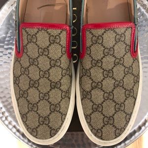 Gucci canvas slip on sneakers.